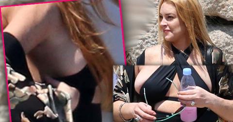 lindsay lohan pregnant boobs nipples wardrobe malfunction pics