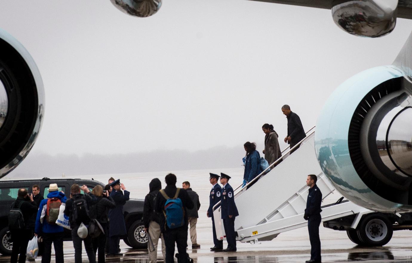 Malia Obama arrives home after a plane trip with her family