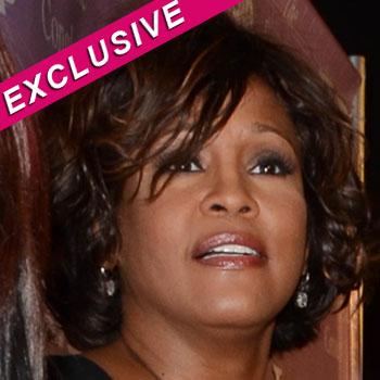 //whitney houston body released splash