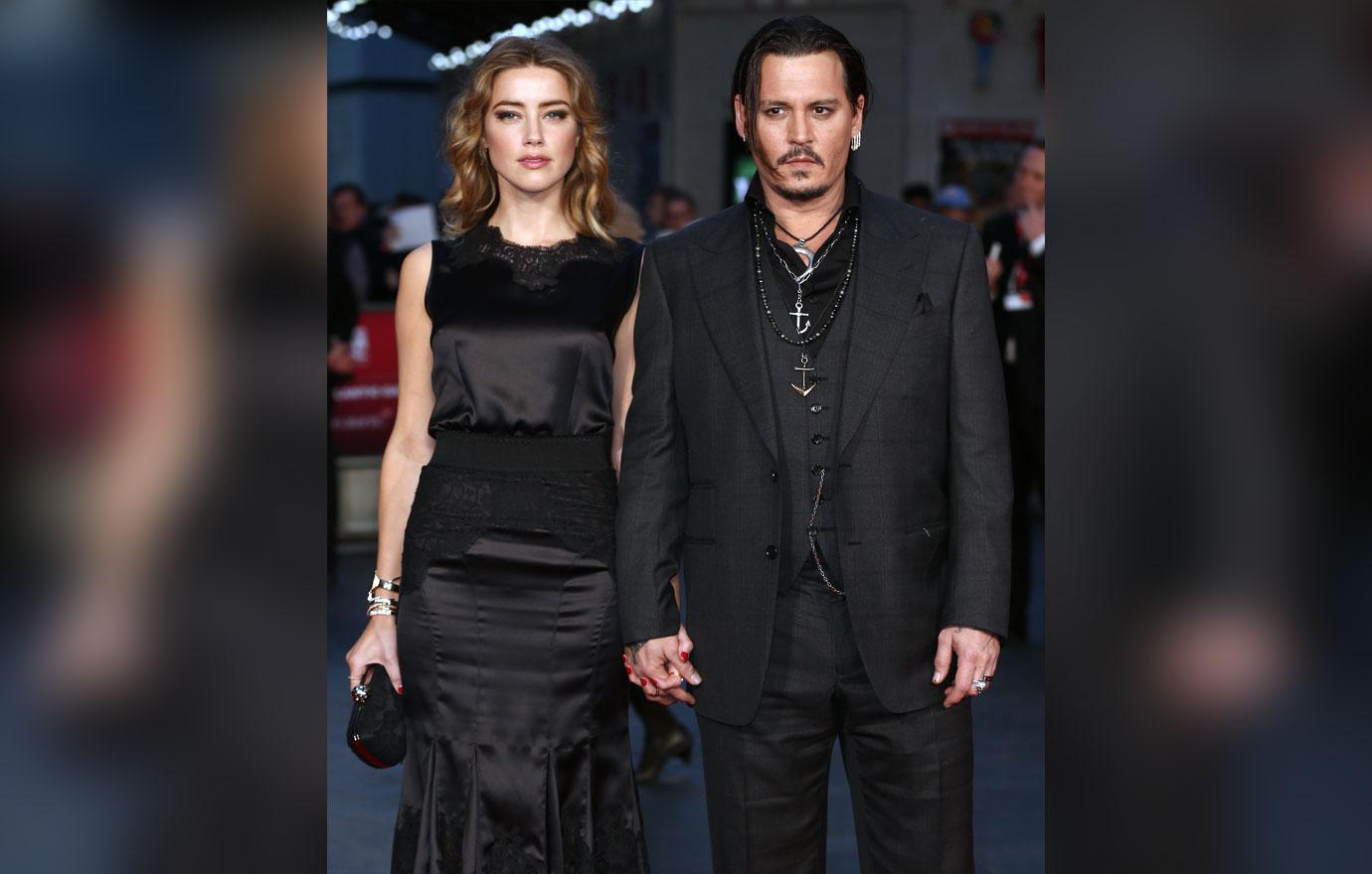 johnny depp sues aclu amber heard  million divorce settlement