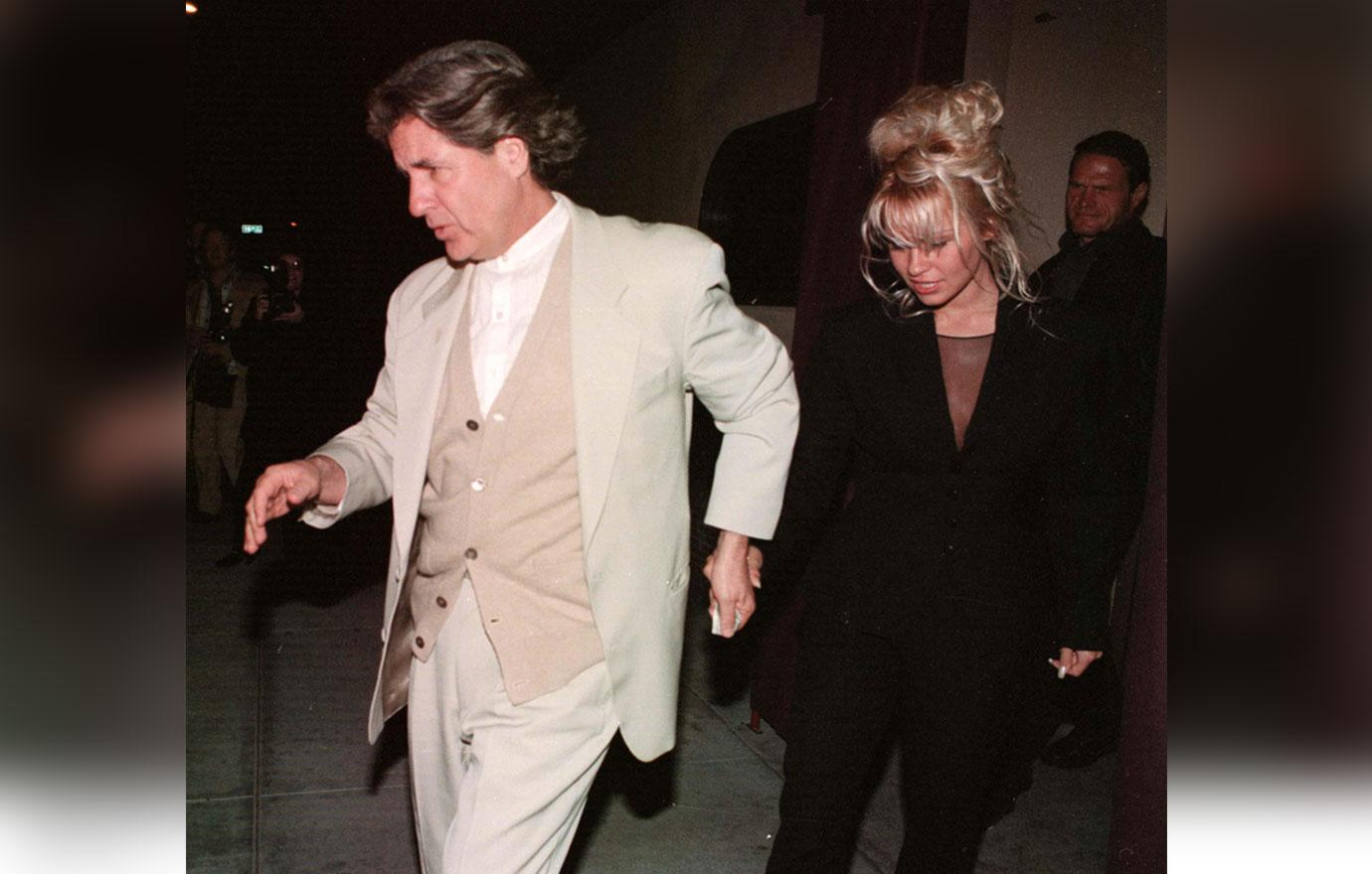 Pam Anderson & Jon Peters Ended Their Quickie Marriage Via Text