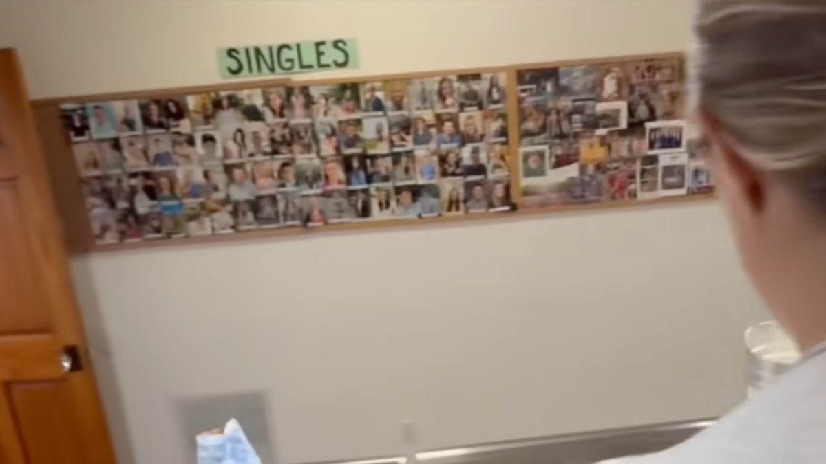 The board featured dozens of photos of young people arranged under a labeled display.