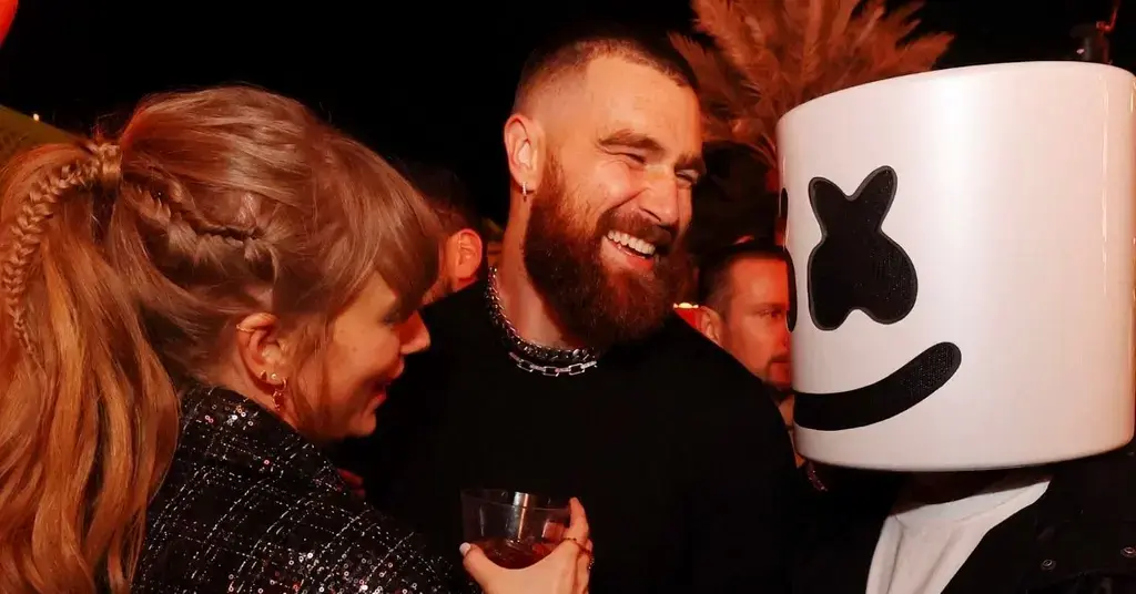 travis kelce reunites taylor swift amsterdam fans eras tour show