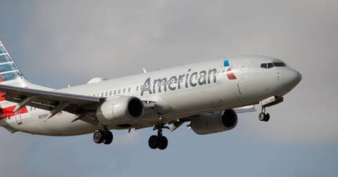 american airlines flight turns around farts pp