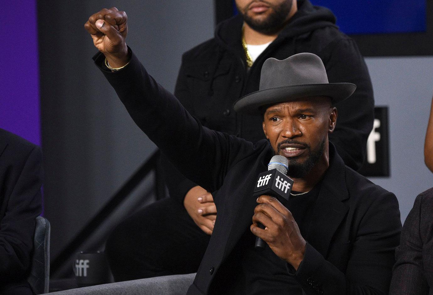 Jamie Foxx gestures as he speaks during a press conference for "Just Mercy" on day three of the Toronto International Film Festival at the TIFF Bell Lightbox, in