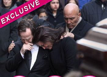 //madonna badger mourning children parents fire