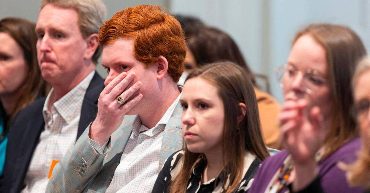 Buster Murdaugh holds his head in hands as his father sobs about