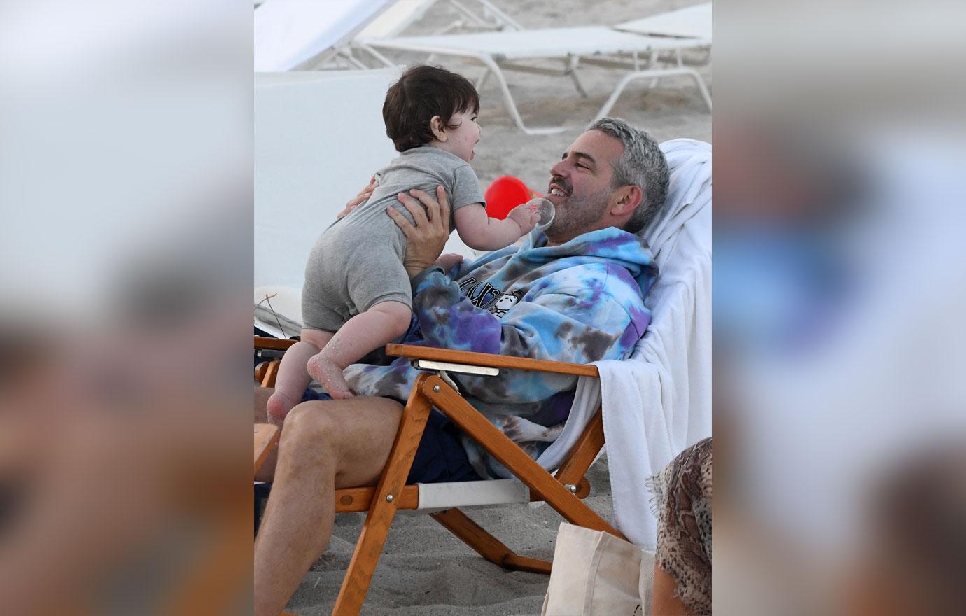 Andy Cohen Looks Buff On Beach With Baby Son