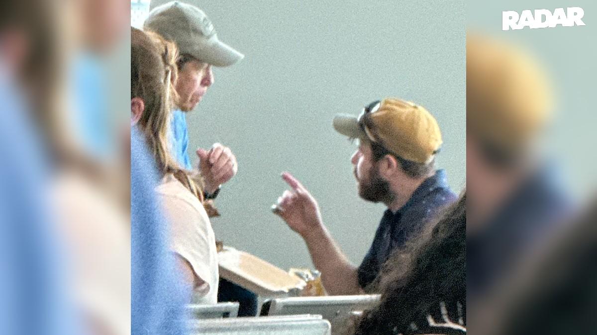Joseph Duggar and Jim Bob appeared to be discussing something while they ate lunch at the airport.