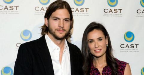 Ashton Kutcher and Demi Moore pose on the red carpet.