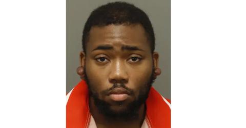 Kameron Gilchrist, 25, allegedly sprayed blood that contained HIV into the eyes of two hospital workers.