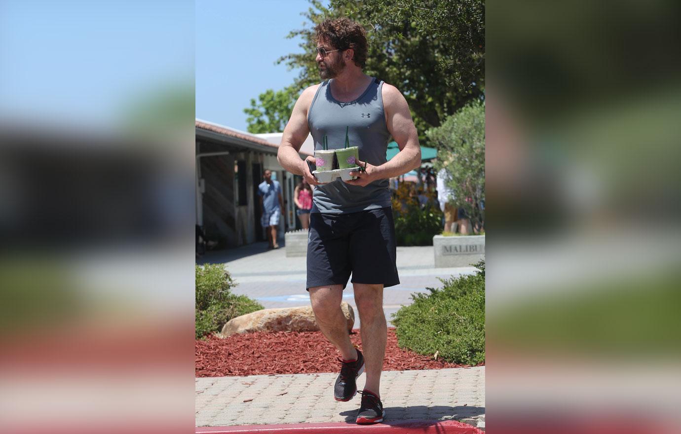 [PICS] Gerard Butler Shows Off Bulging Muscles In A Tank