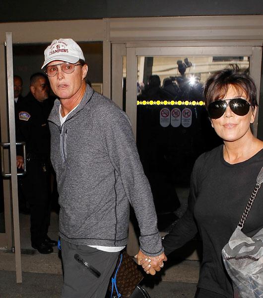 //kris and bruce jenner hold hands