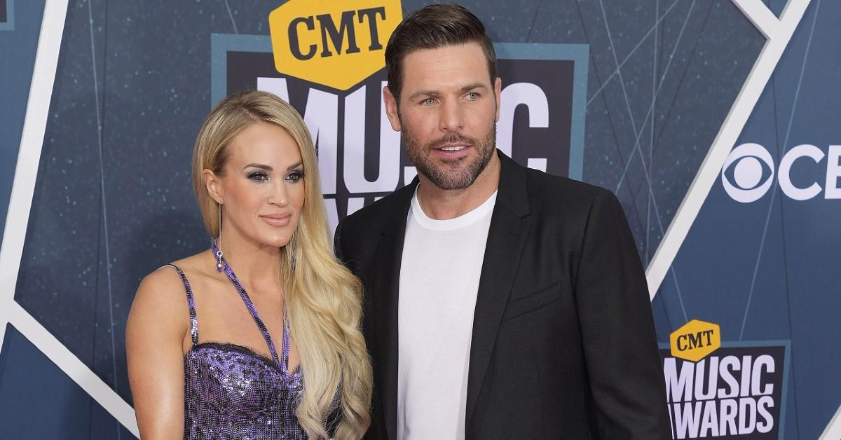 Carrie Underwood (left) and Mike Fisher