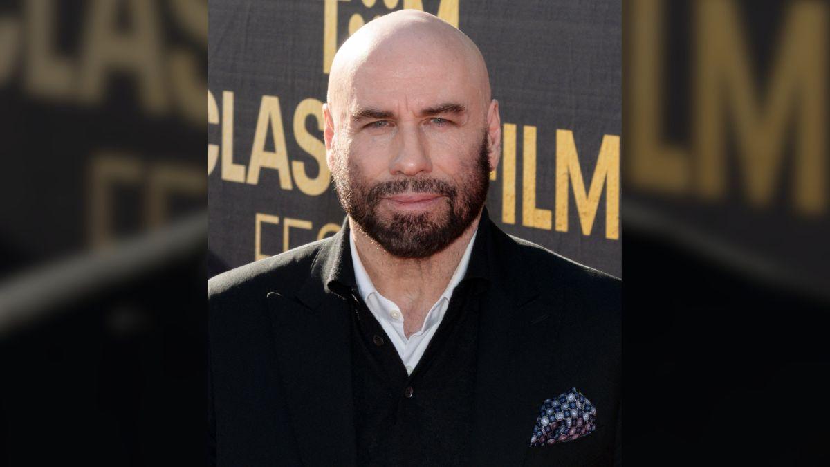 image of The trio stood and applauded as David Miscavige addressed attendees.