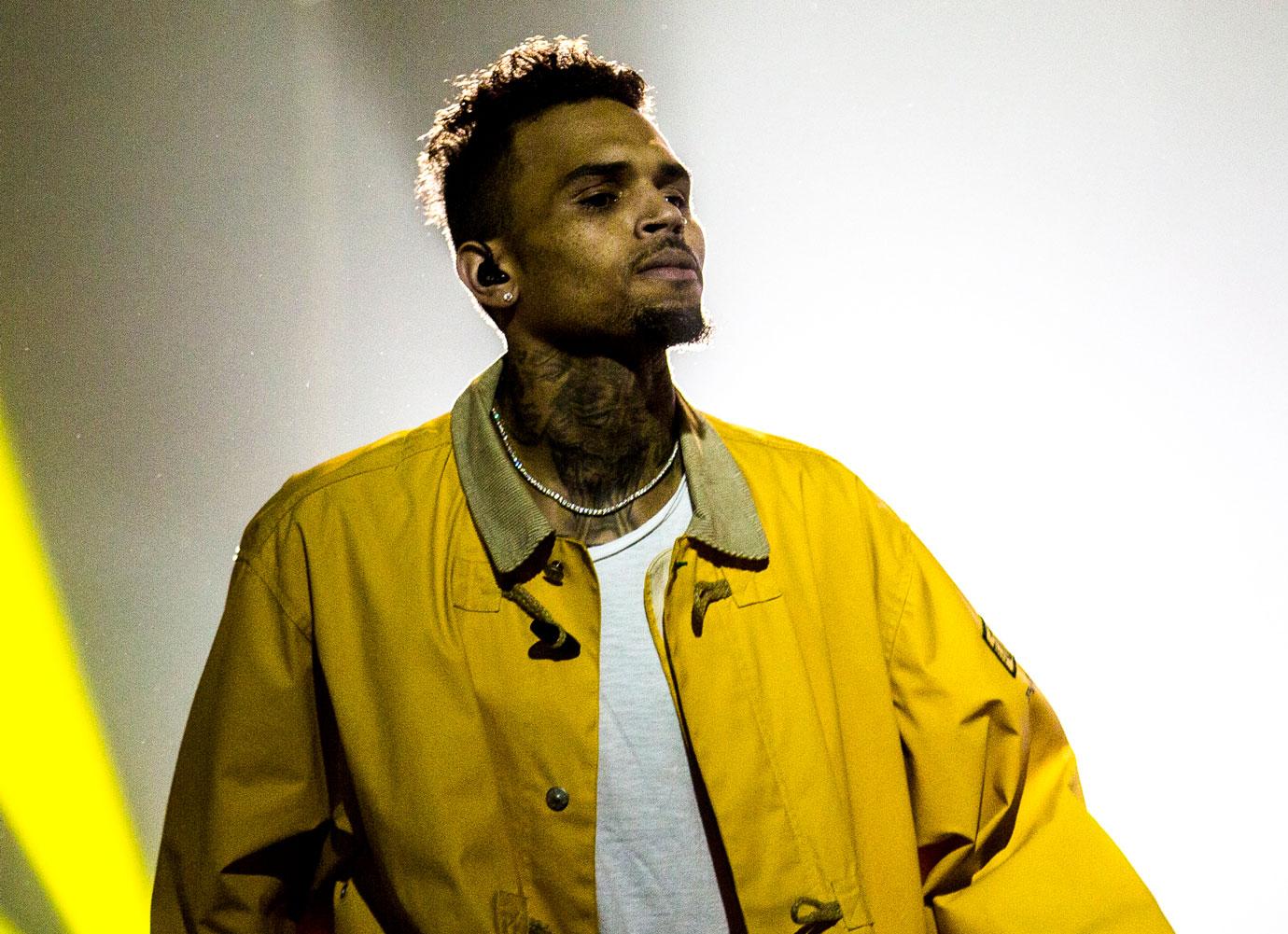 chris brown no charges battery la mansion woman weave smacked off