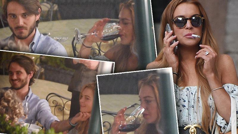 //lindsay lohan drinking wine having pda boyfriend italy