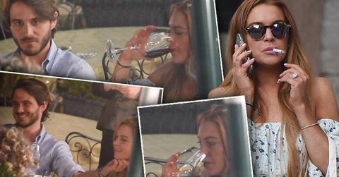 //lindsay lohan drinking wine having pda boyfriend italy