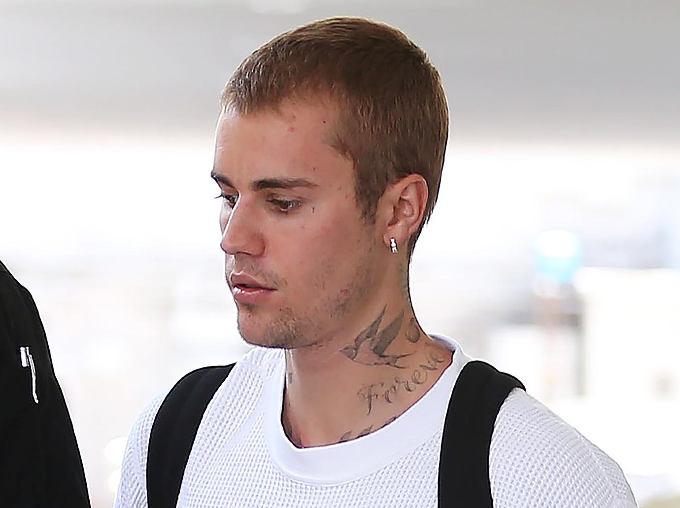 justin bieber demands  million off woman gallery pic