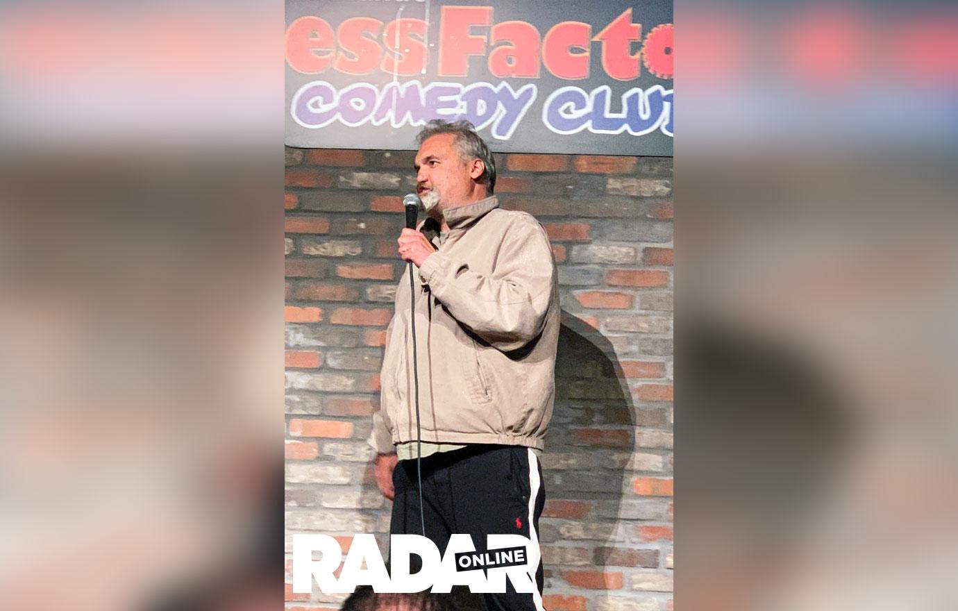 Arrtie Lange Performing On STage At Stress Factory Comedy Club