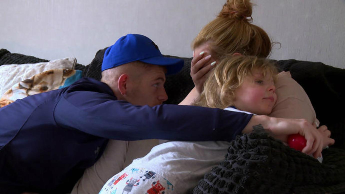 Amber on Teen Mom UK is hugged by her child and ex-boyfriend.