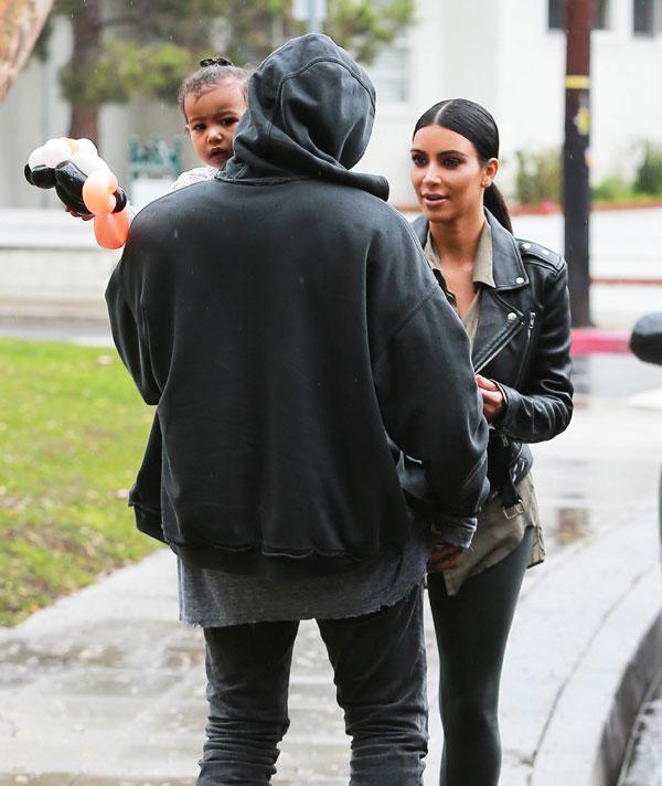 Daddys Girl Kanye West Dotes On North As He Carries Her Out Of A Party With Kim Kardashian 