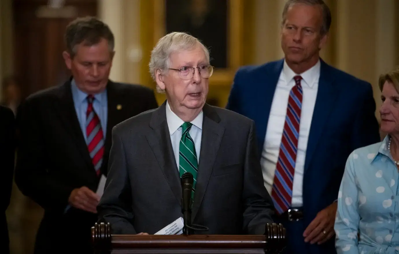 mitch mcconnell boo protestors retire