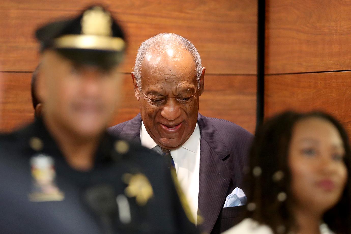 bill cosby handcuffed first photos no bail prison sentence