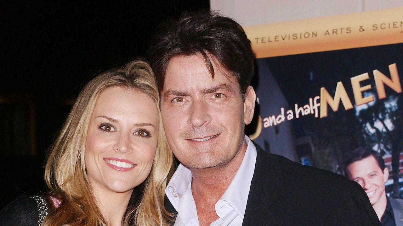Charlie Sheen agreed to pay Brooke Mueller $500,000 to settle their long-running child support dispute.