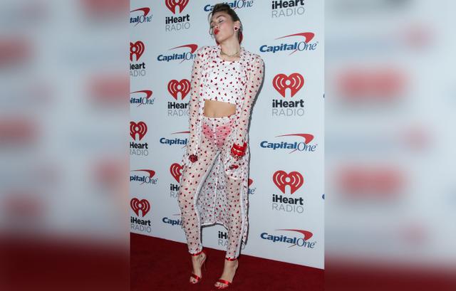 Wardrobe Malfunction Miley Cyrus Flashes Red Underwear In Sheer Outfit 