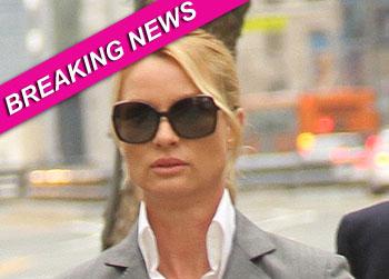 //nicollette sheridan jury deadlocked trial splash