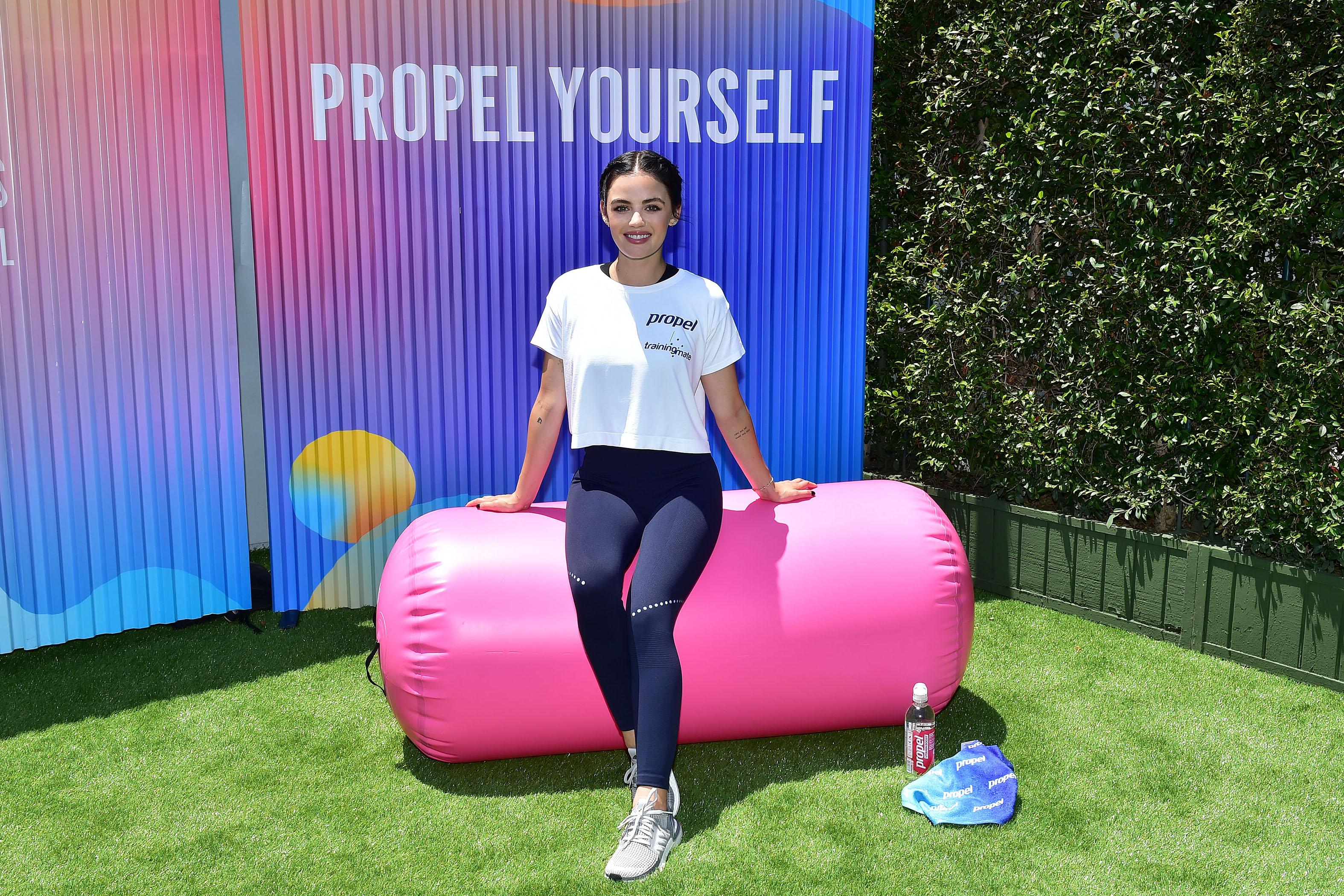 Lucy Hale co-leads a class at the Propel Co:Labs Fitness Festival with Luke Milton of Training Mate in Santa Monica. The event is a one-of-a-kind celebration of movement filled with heart-pumping workouts, live music and holistic wellness.