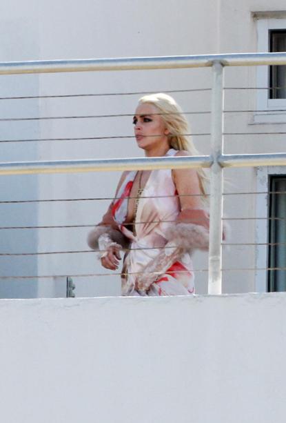 Lindsay Lohan flashes her breasts on Miami Beach in second wardrobe  malfunction of the day