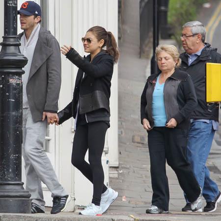 Ashton Kutcher & Mila Kunis Stroll With Her Parents In London