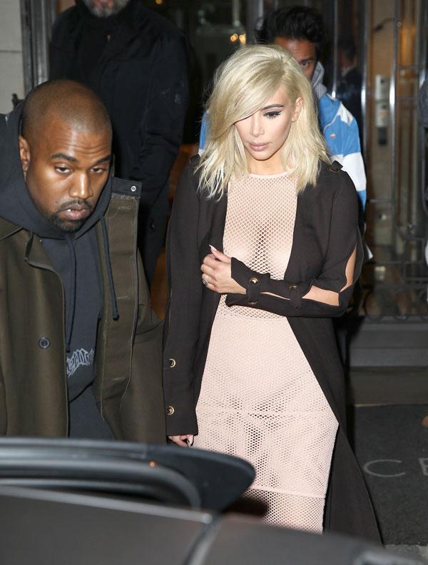 Peek-A-Boob! Kim Kardashian Suffers Nip Slip While Debuting New Blonde