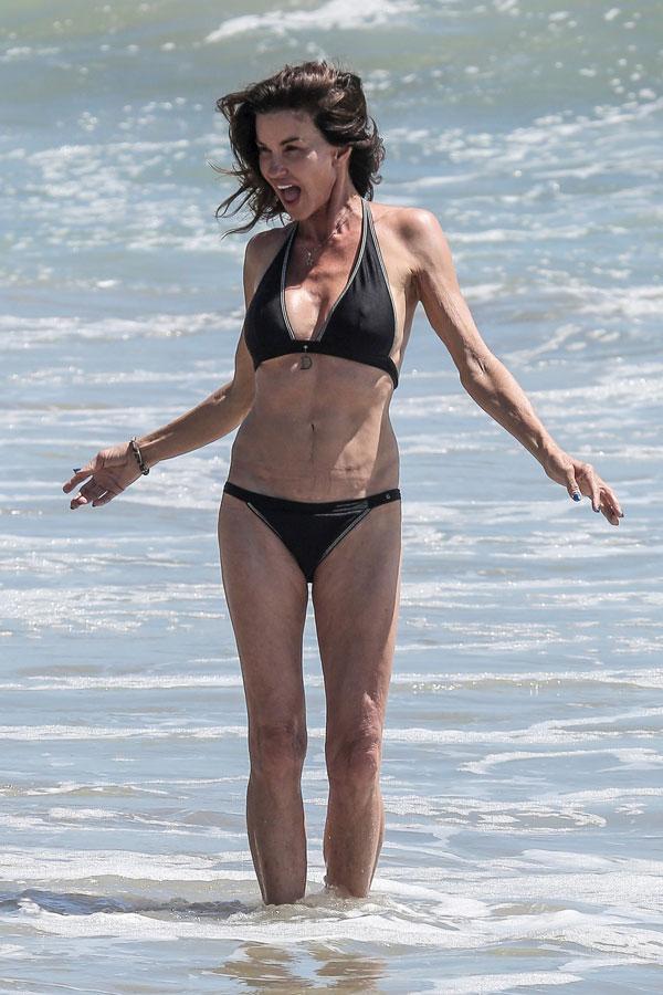 Janice Dickinson Giving The Middle Finger Bikini Photos