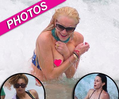 //lindsay lohan loses bikini top _ _