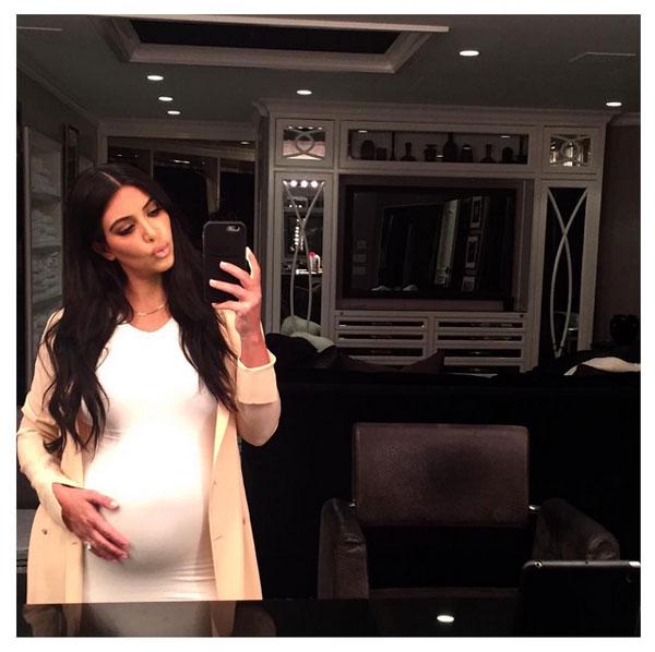 //kim kardashian pregnant bump changing