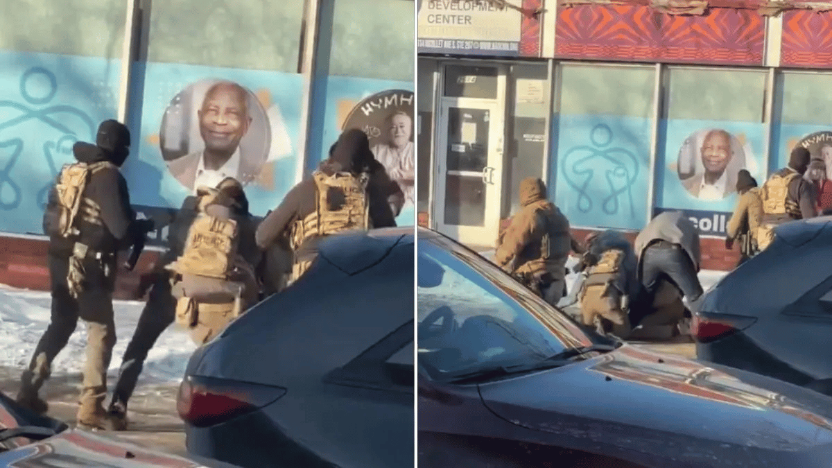 Photo of ICE agents wrestling Pretti to the ground before fatally shooting him