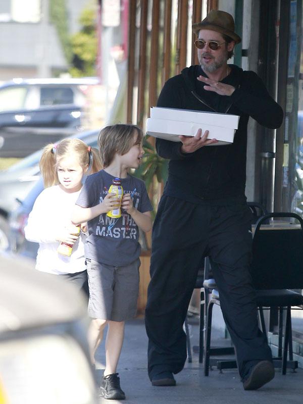 Brad Pitt Photos -- Actor Sports Black Eye Taking Out Twins Vivienne and Knox