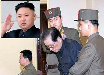 JANG SONG THAEK IS DRAGGED INTO THE COURT BY UNIFORMED PERSONNEL