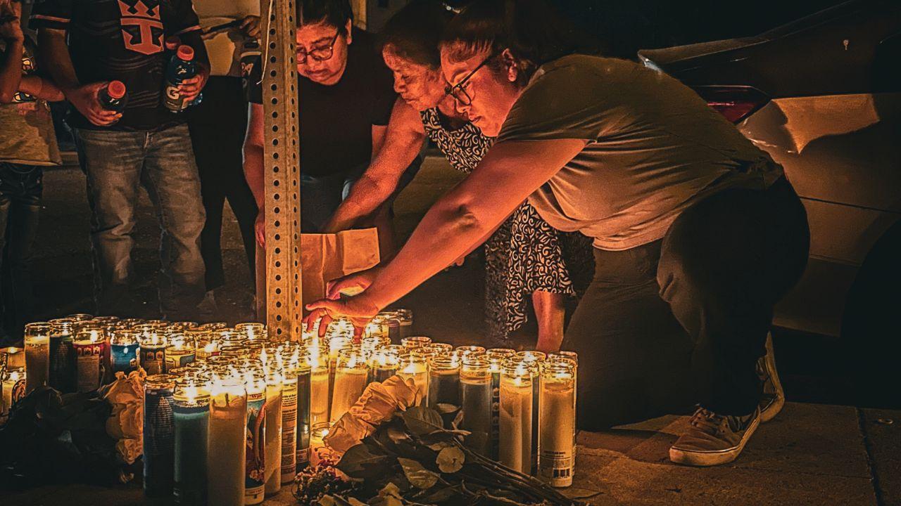 Photo of Sandy Sanchez at her husband's vigil