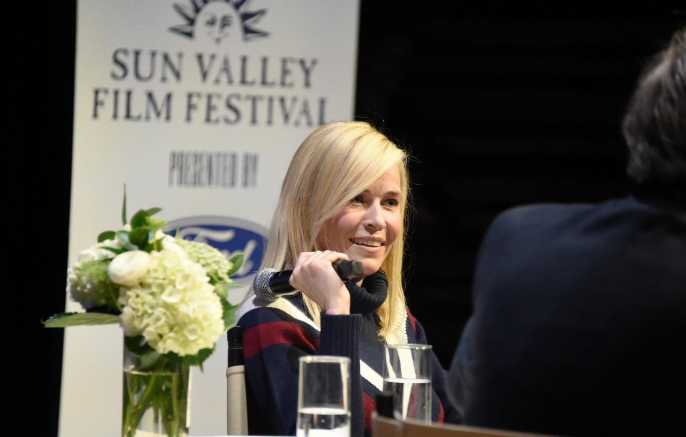 Chelsea Handler sits on stage at a film festival.