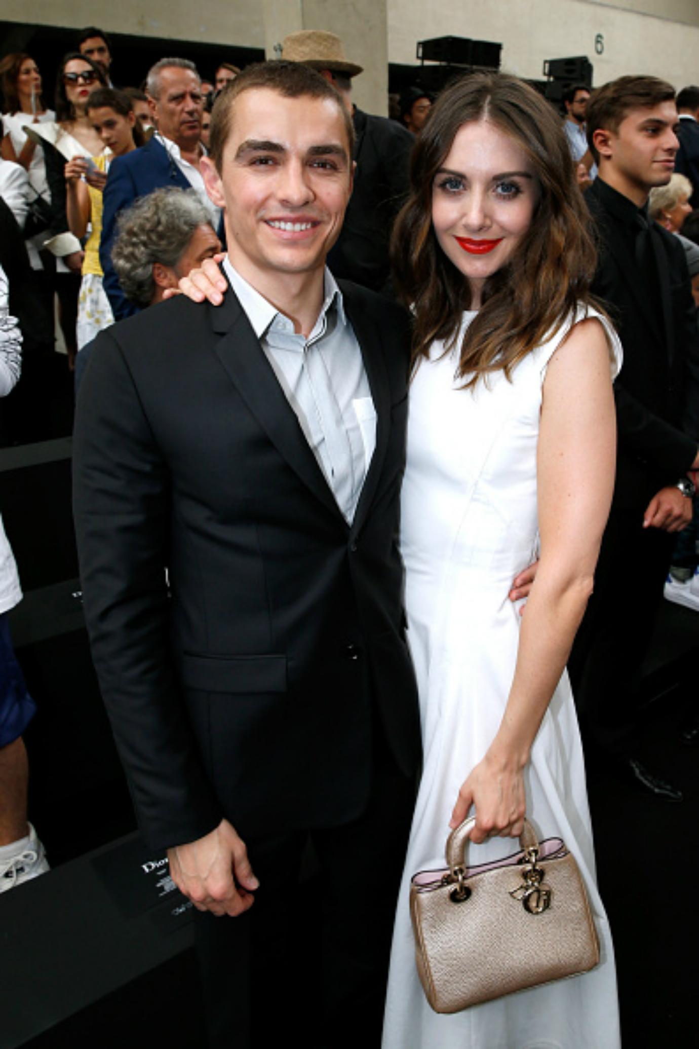 Alison Brie and Dave Franco pose for a photograph.