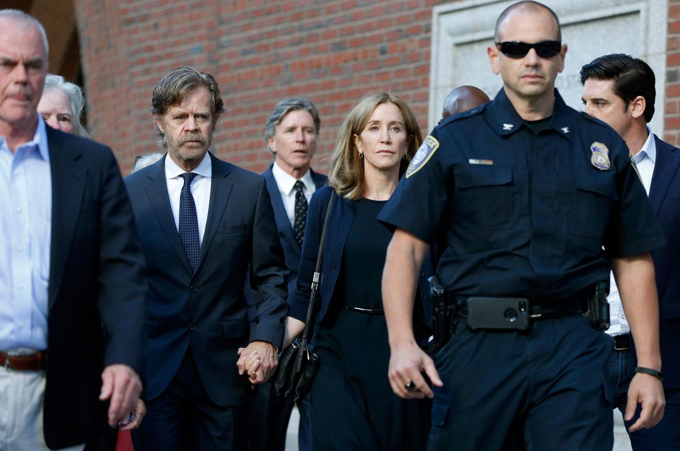 Felicity Huffman leaves federal court with her husband William H. Macy after she was sentenced in a nationwide college admissions bribery scandal, in Boston