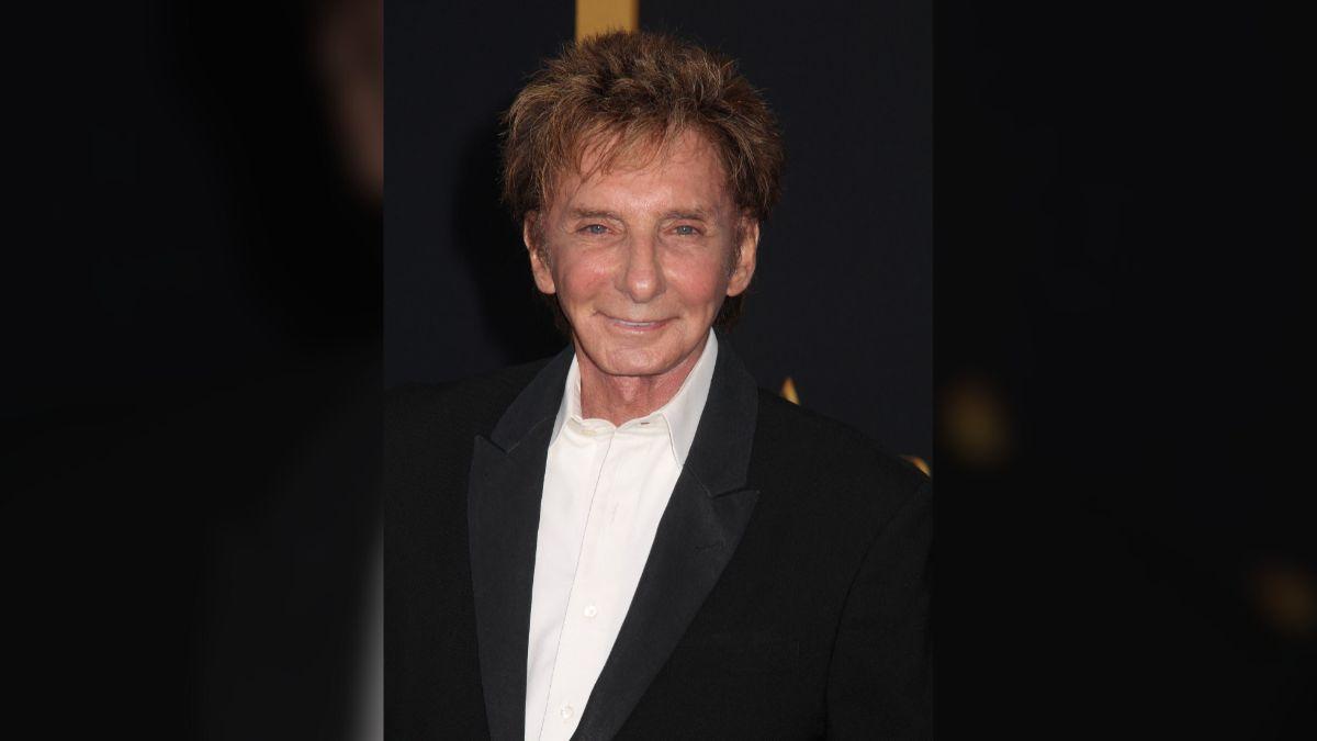 Manilow paused his Christmas 'Gift of Love' concert tour after revealing he needed surgery to remove a cancerous spot on his lung.