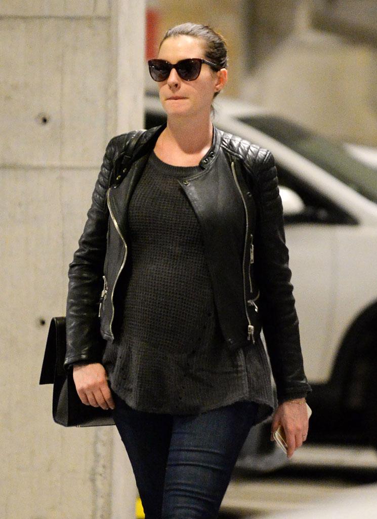 Pregnant Anne Hathaway Bundles Baby Bump In Sexy Leather Jacket