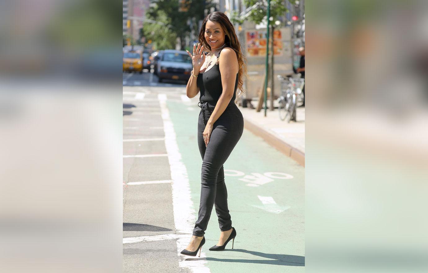 La La Anthony braless sheer top heels