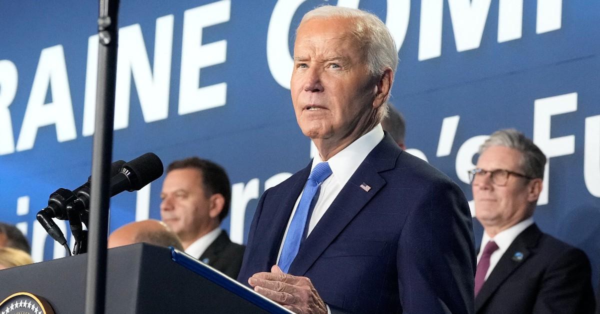 President Joe Biden standing at a podium.