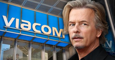 David Spade Looks Worried In Front of Viacom Building Logo Sign Facade